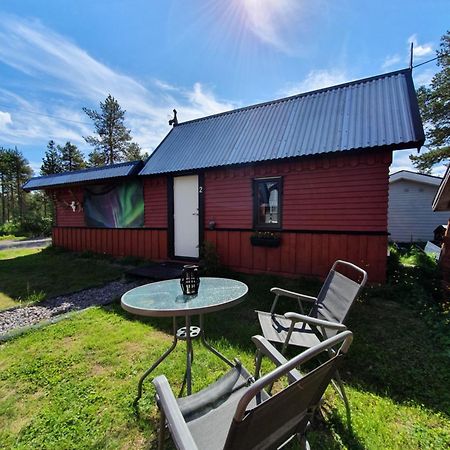 Camp Caroli Wooden Cabins Jukkasjärvi Esterno foto