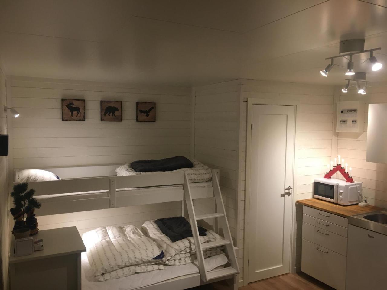 Camp Caroli Wooden Cabins Jukkasjärvi Esterno foto