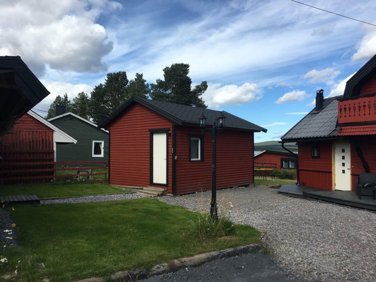 Camp Caroli Wooden Cabins Jukkasjärvi Esterno foto